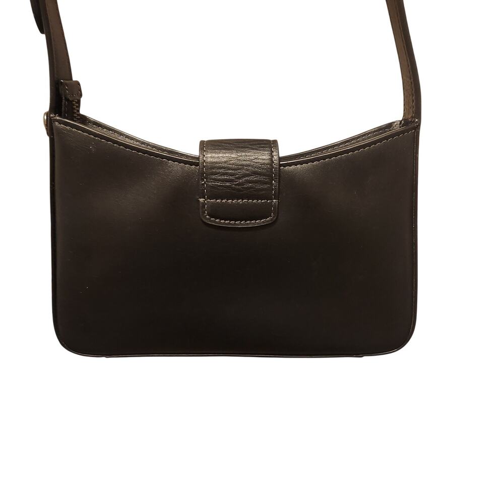 Small black Coach purse with Snap closure